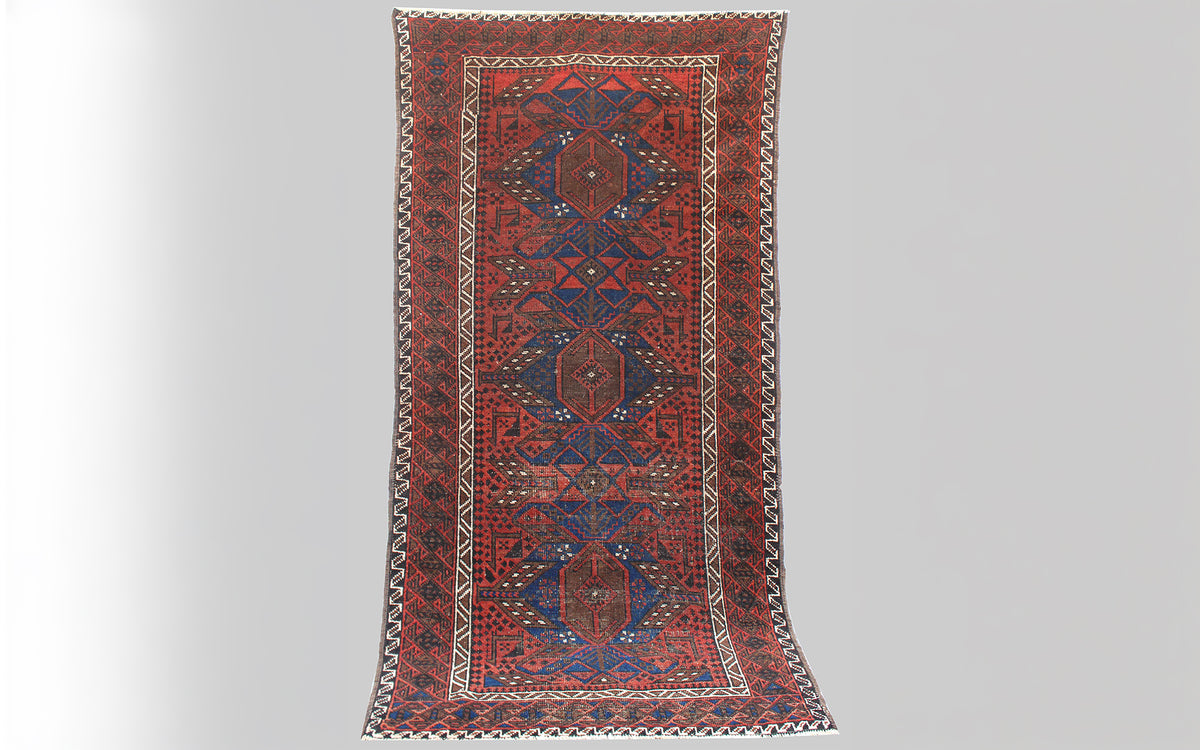 Vintage Persian Baloch rug - red, blue & sand