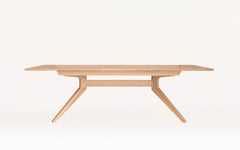 Cross extending table