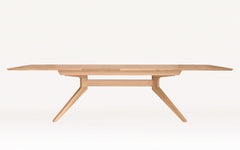 Cross extending table