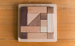 Wooden puzzle block