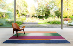 Asymmetrical Maroon flatweave rug