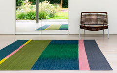 Asymmetrical Olive flatweave rug