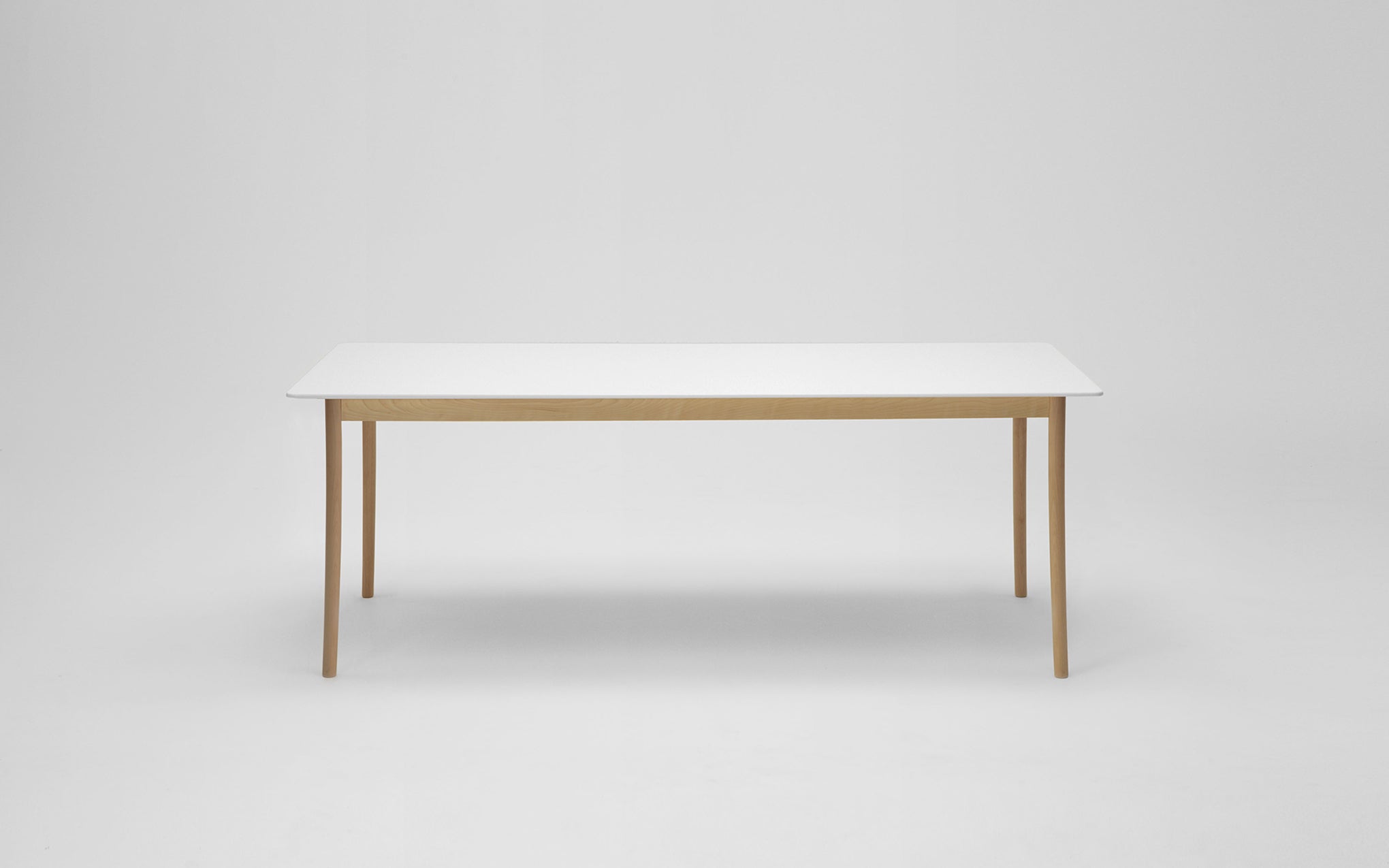 Lightwood dining table - corian top