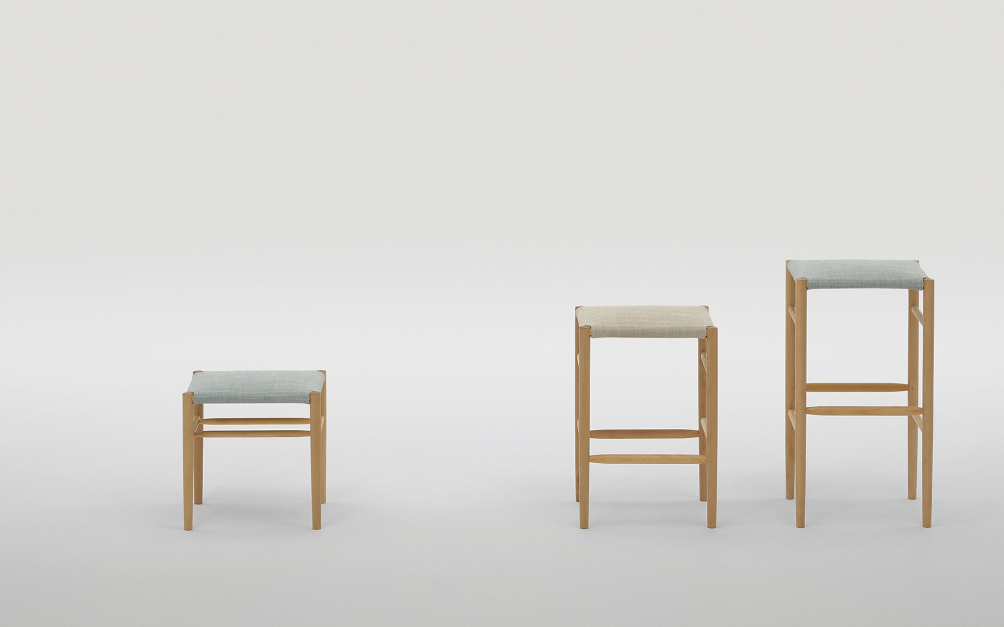 Lightwood low stool - cushioned seat