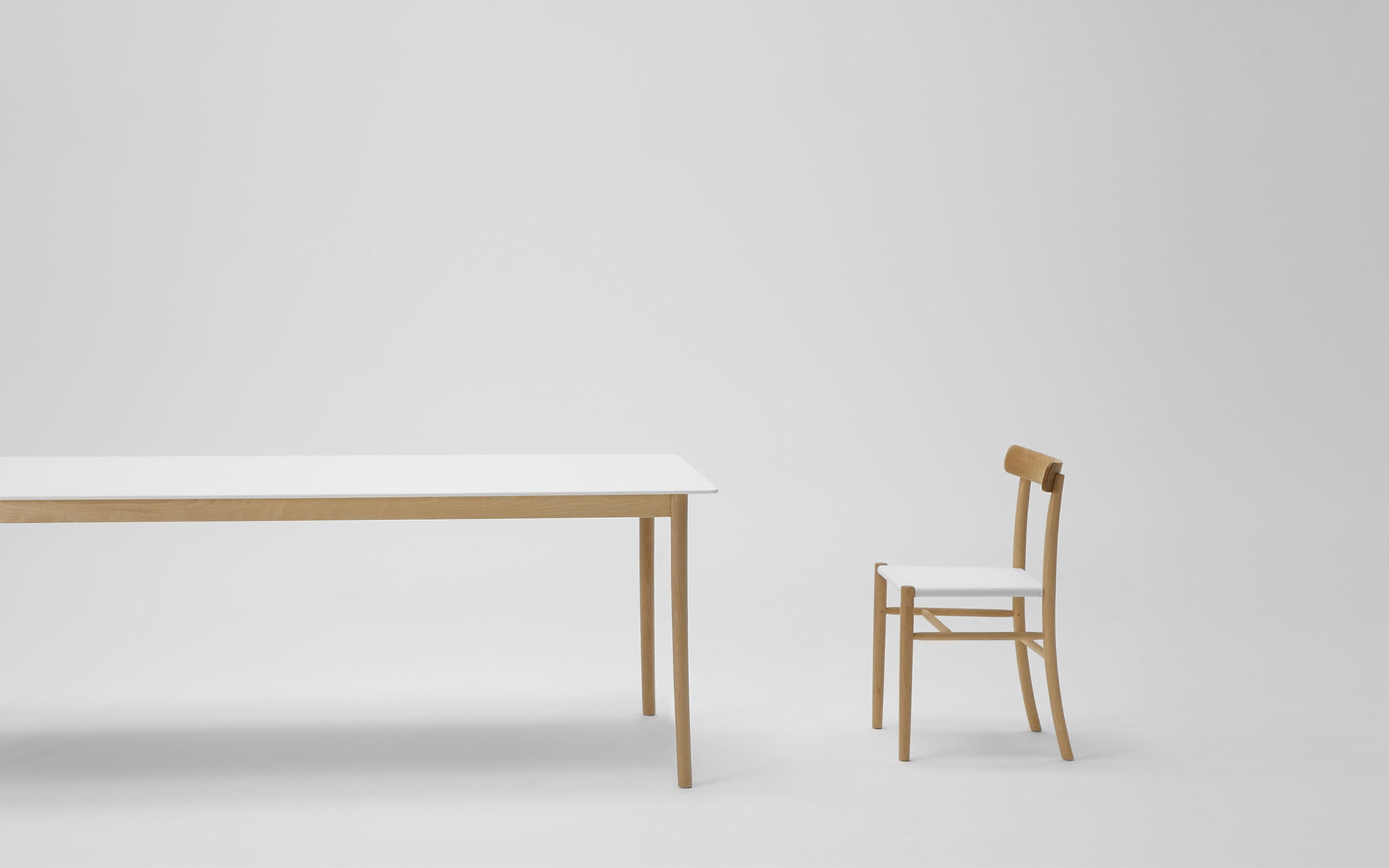 Lightwood dining table - corian top