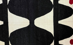 Modern Kelim – black triangles w. ruby dots
