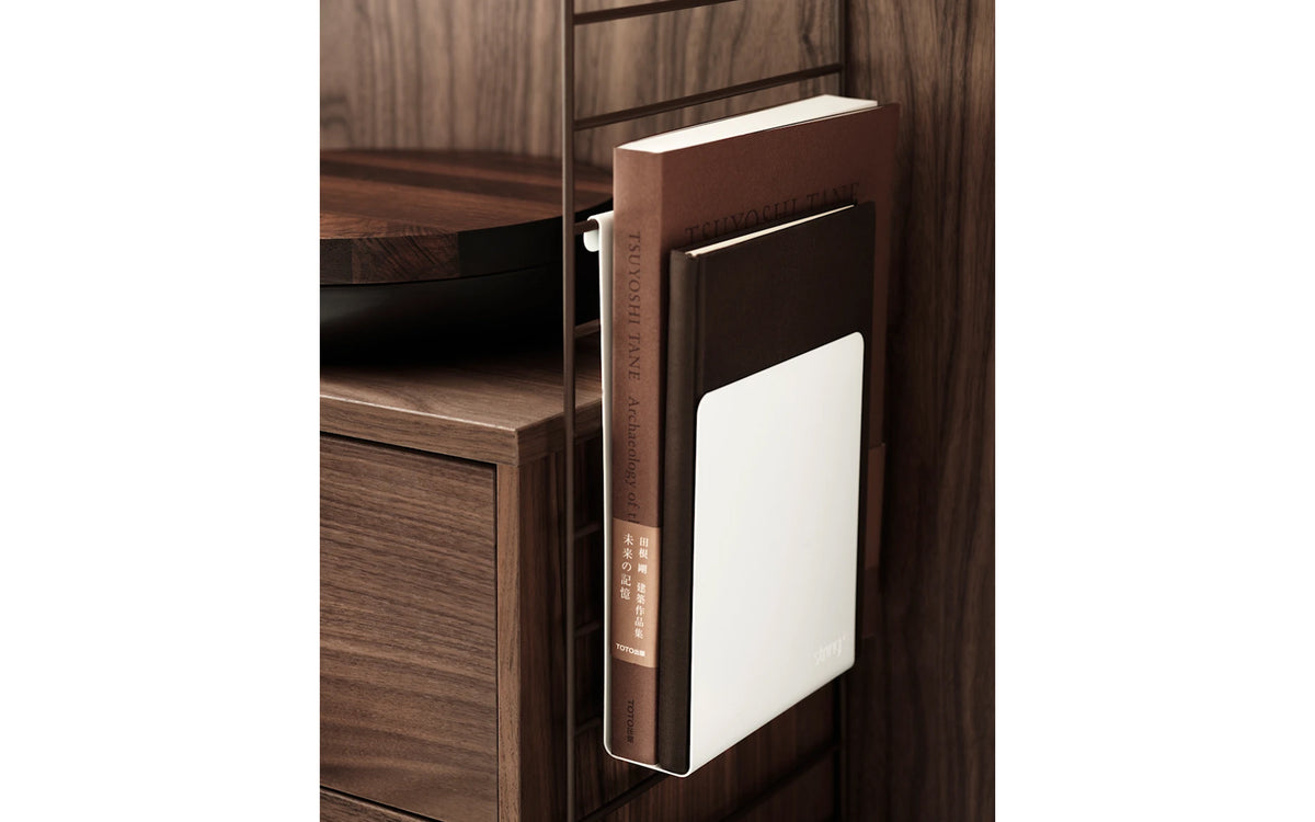 String magazine holder