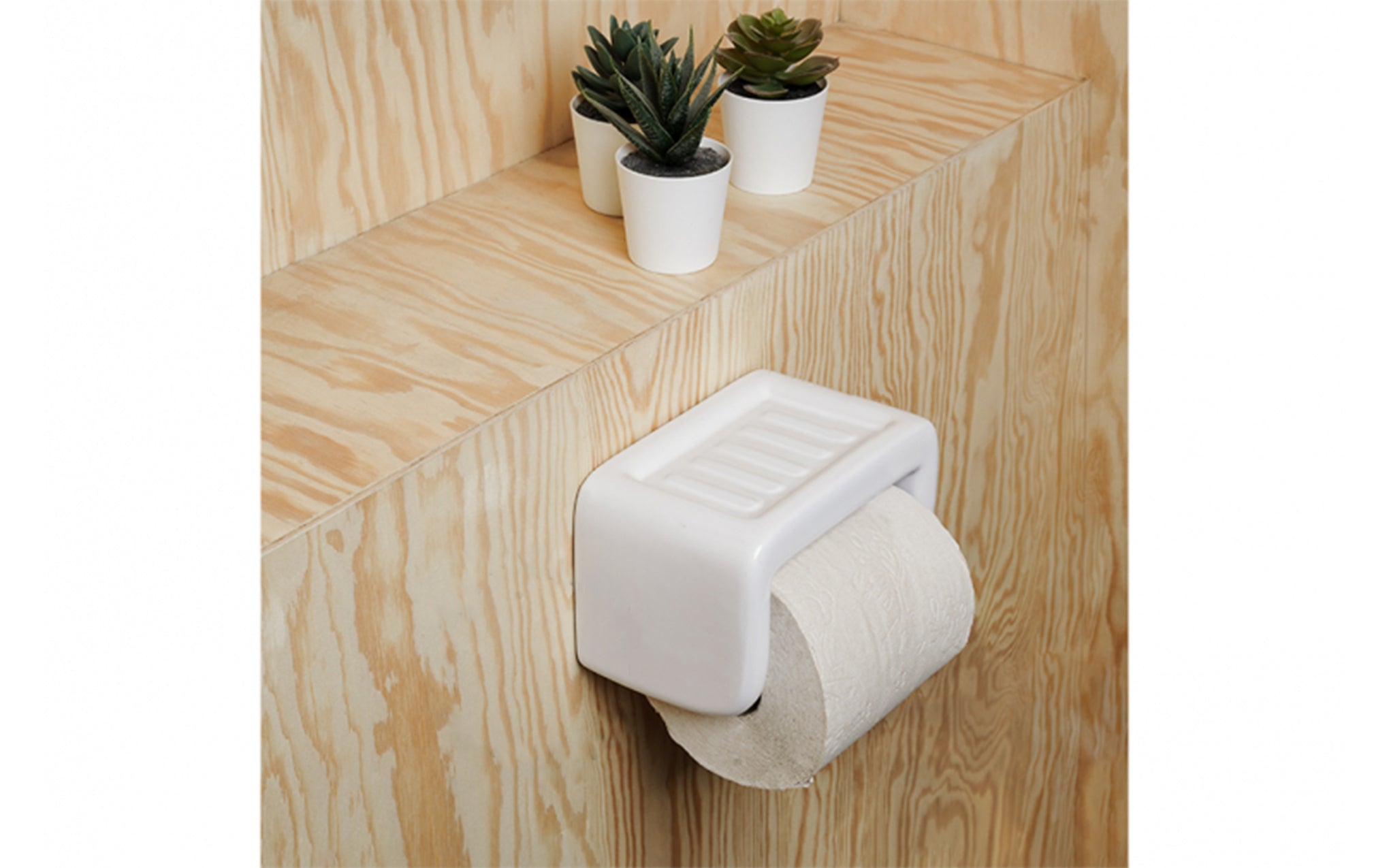 Porcelain toilet roll holder with soap dish