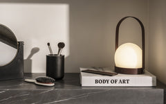 Carrie portable table lamp