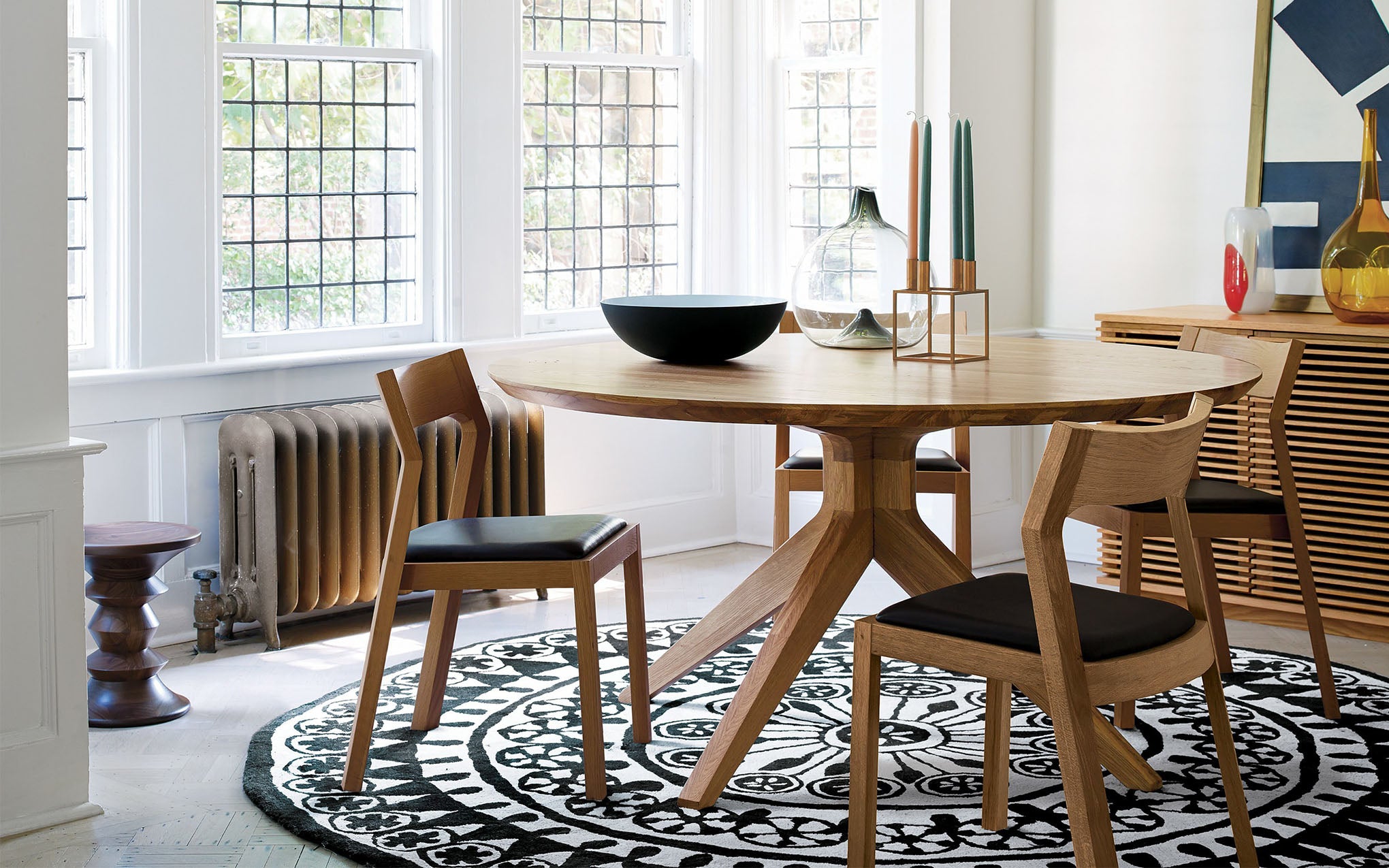 Cross round dining table