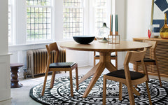 Cross round dining table
