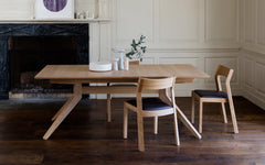 Cross extending table