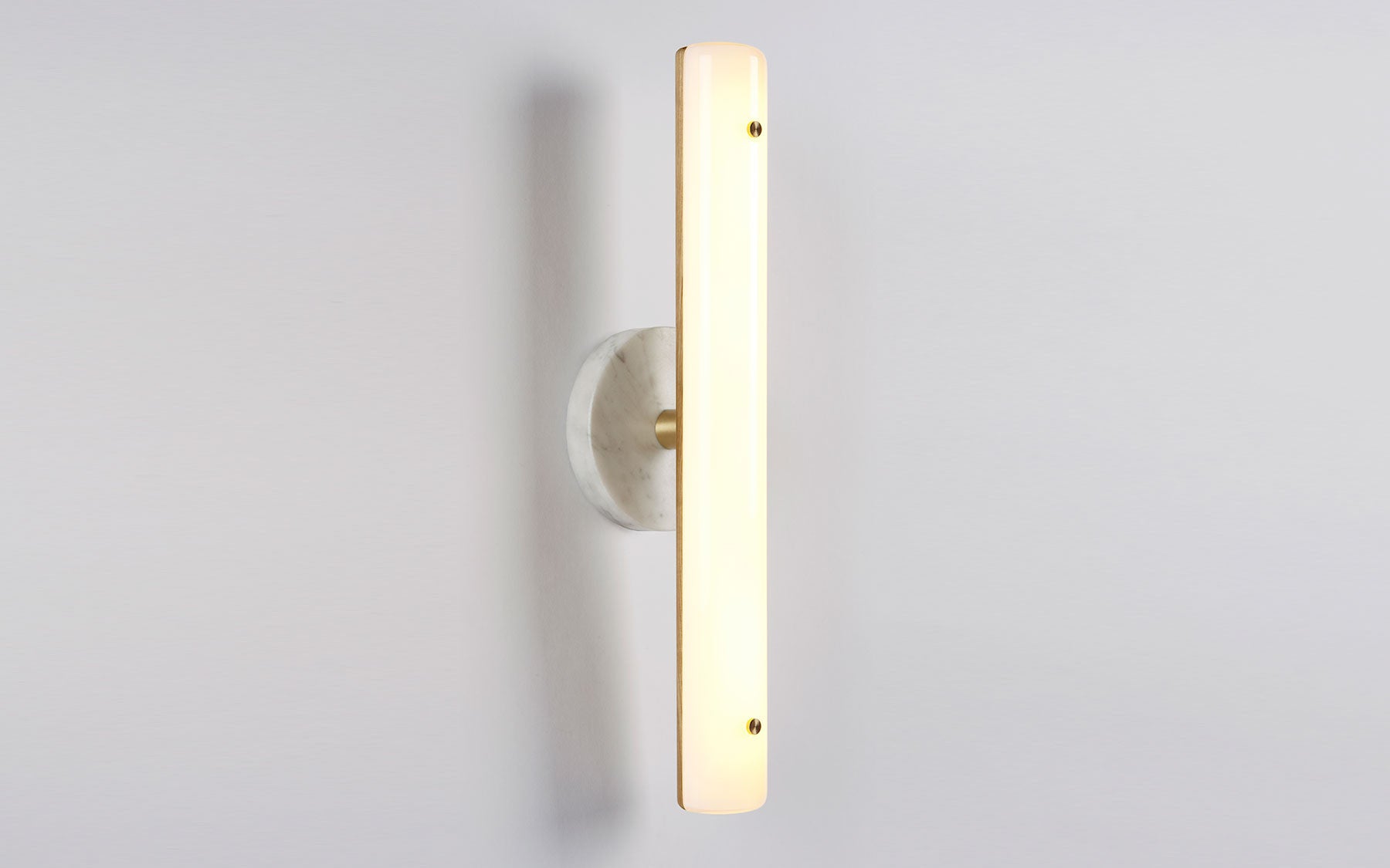 Counterweight circular wall sconce