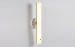 Counterweight circular wall sconce