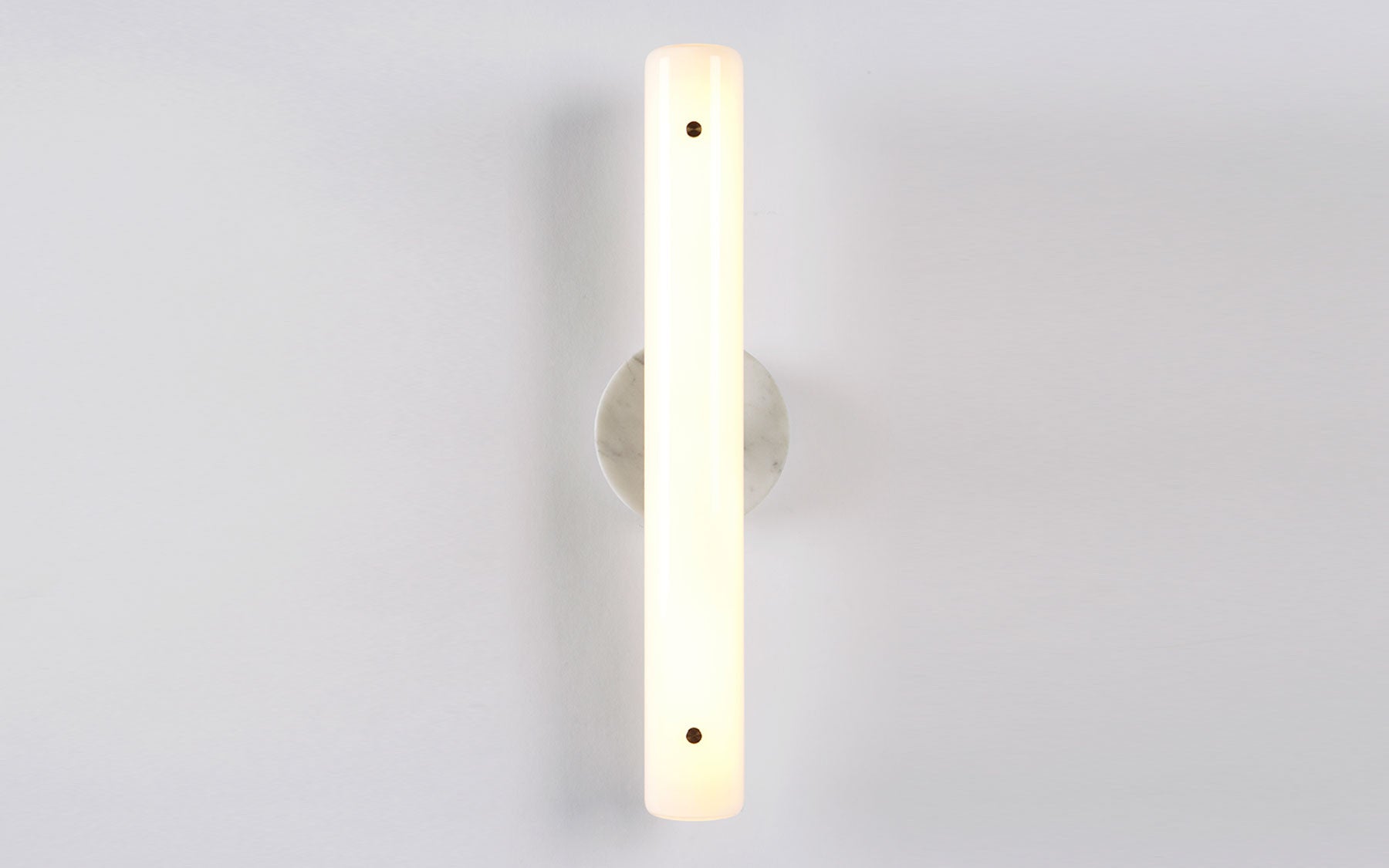 Counterweight circular wall sconce