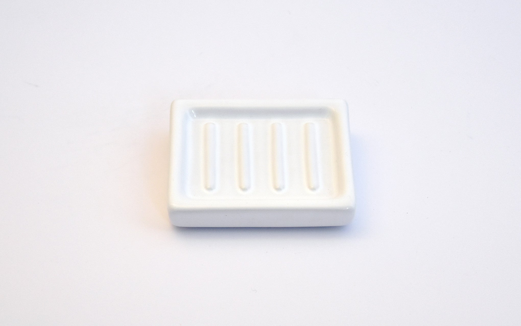 Porcelain soap holder