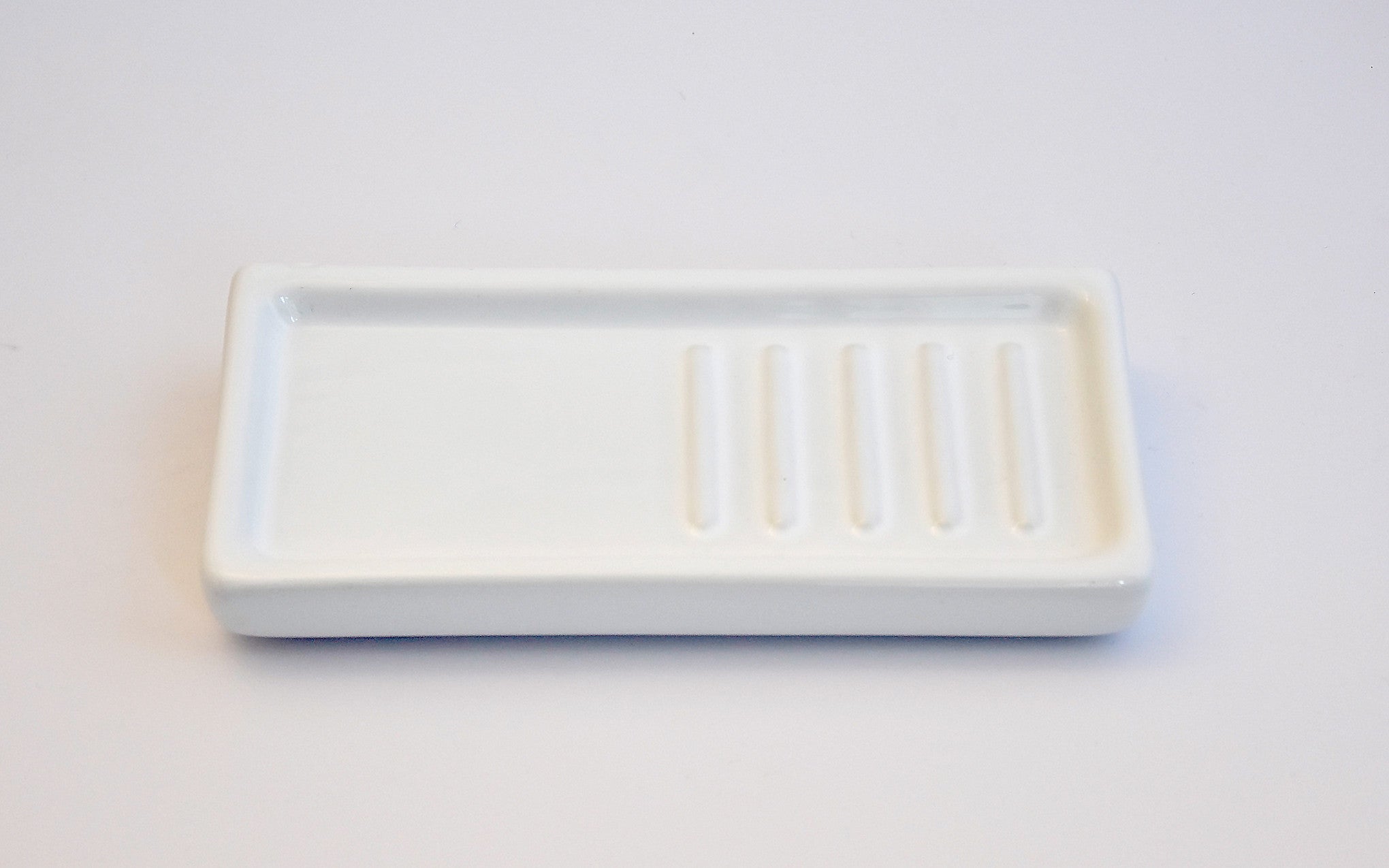 Porcelain soap shelf